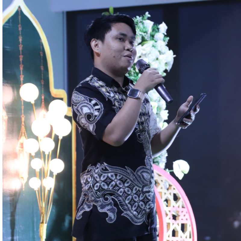 Wahyu speaking at an event